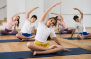 Kids doing yoga for mental health