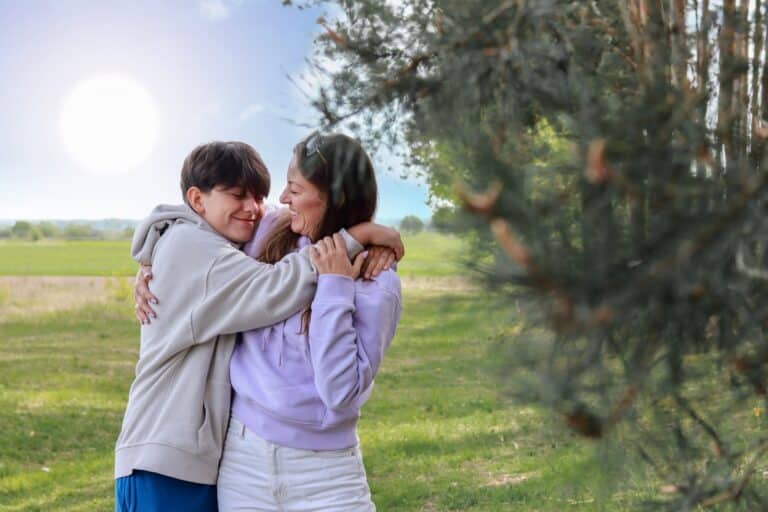 Mother and son spending time together. Parents and teen. Teenage boy hugs mom.